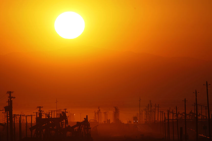 LOST HILLS, CA - MARCH 24:  The sun rises over an oil field over the Monterey Shale formation where gas and oil extraction using hydraulic fracturing, or fracking, is on the verge of a boom on March 24, 2014 near Lost Hills, California. Critics of fracking in California cite concerns over water usage and possible chemical pollution of ground water sources as California farmers are forced to leave unprecedented expanses of fields fallow in one of the worst droughts in California history. Concerns also include the possibility of earthquakes triggered by the fracking process which injects water, sand and various chemicals under high pressure into the ground to break the rock to release oil and gas for extraction though a well. The 800-mile-long San Andreas Fault runs north and south on the western side of the Monterey Formation in the Central Valley and is thought to be the most dangerous fault in the nation. Proponents of the fracking boom saying that the expansion of petroleum extraction is good for the economy and security by developing more domestic energy sources and increasing gas and oil exports.   (Photo by David McNew/Getty Images)