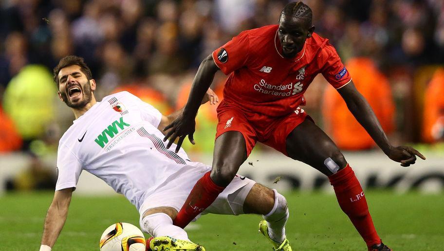 LIVERPOOL, ENGLAND - FEBRUARY 25: Mamadou Sakho of Liverpool and Halil Altintop of Augsburg compete for the ball during the UEFA Europa League Round of 32 second leg match between Liverpool and FC Augsburg at Anfield on February 25, 2016 in Liverpool, United Kingdom. (Photo by Clive Brunskill/Getty Images)