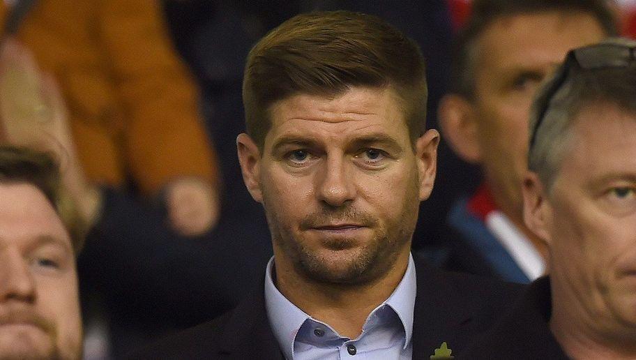 Former Liverpol player and current LA Galaxy midfielder, Steven Gerrard watches the players warm up ahead of the English Premier League football match between Liverpool and Crystal Palace at the Anfield stadium in Liverpool, north-west England on November 8, 2015. AFP PHOTO / PAUL ELLIS RESTRICTED TO EDITORIAL USE. No use with unauthorized audio, video, data, fixture lists, club/league logos or 'live' services. Online in-match use limited to 75 images, no video emulation. No use in betting, games or single club/league/player publications. (Photo credit should read PAUL ELLIS/AFP/Getty Images)