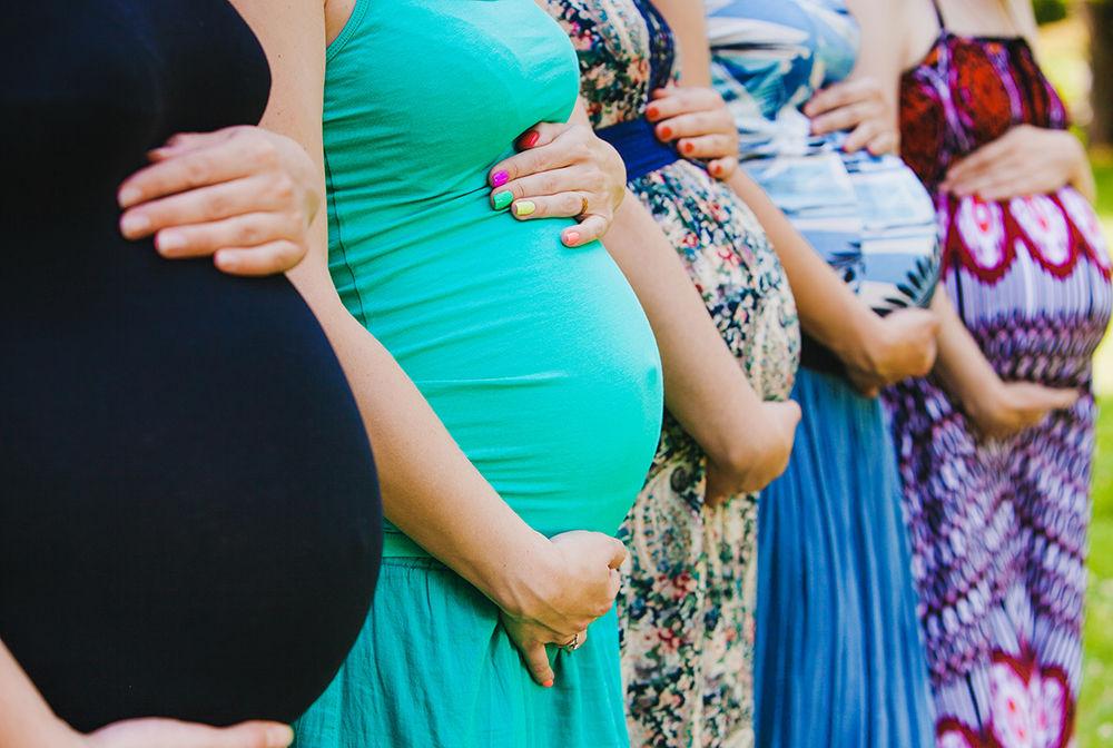 group%20of%20pregnant%20women%20holding%20bellies[1]