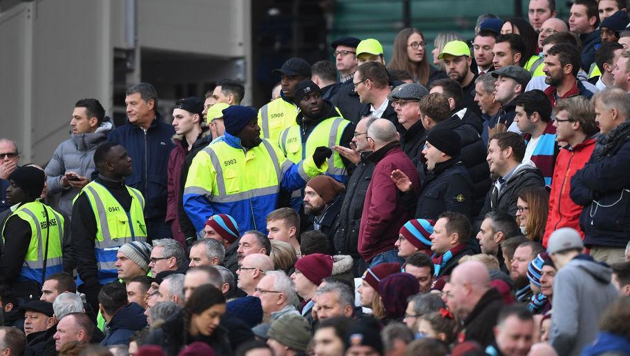 LONDON, ENGLAND - NOVEMBER 05: Stewards and fans argue during the Premier League match between West Ham United and Stoke City at Olympic Stadium on November 5, 2016 in London, England.  (Photo by Shaun Botterill/Getty Images)