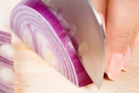 woman-cutting-onion-horiz
