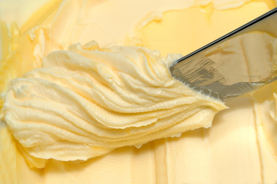Butter and knife, background