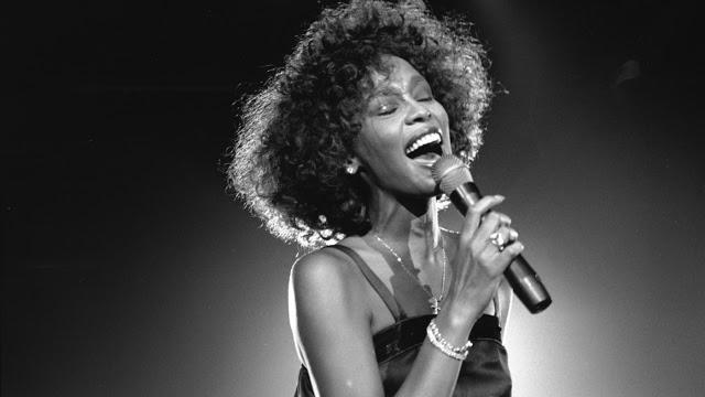 CIRCA 1988:  Pop singer Whitney Houston performs onstage in 1988. (Photo by David Corio/Michael Ochs Archives/Getty Images)