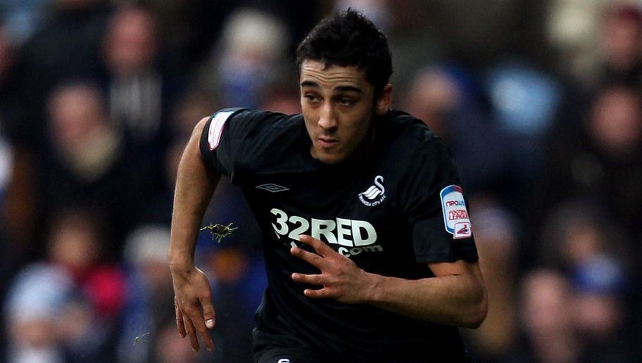 LONDON, ENGLAND - DECEMBER 26:  Neil Taylor of Swansea City in action during the npower Championship match between Queens Park Rangers and Swansea City at Loftus Road on December 26, 2010 in London, England.  (Photo by Warren Little/Getty Images)